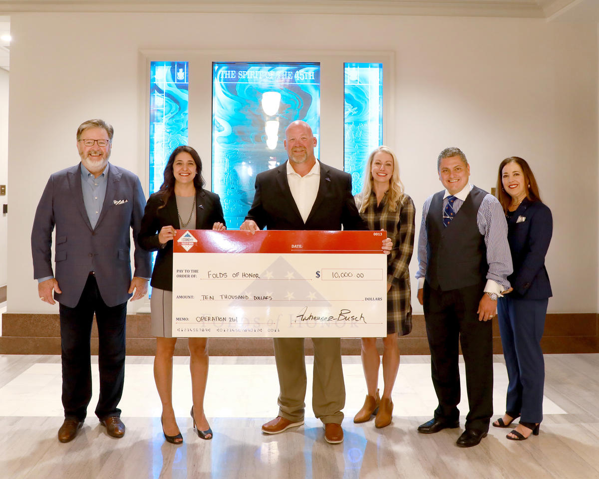 State Sen. Stephanie Bice, named as honorary chair of Oklahoma Folds of Honor’s Operation 261 scholarship campaign, was on hand for the presentation of a $10,000 donation by Anheuser-Bush to the organization.  Left to right, Gary Huddleston, director, Folds of Honor Oklahoma City Chapter, Sen. Stephanie Bice, R-Oklahoma City, Jason Hall, senior director of sales and marketing, Anheuser-Busch Sales of Oklahoma, Monica Woodward, regional development officer, Folds of Honor, Maj. Ed Pulido, senior vice-preside