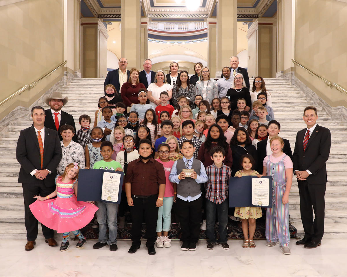 Sen. Chris Kidd, Rep. Trey Caldwell, Lt. Gov. Matt Pinnell joined Frederick 3rd graders and staff, representatives from the Dept. of Ag and the Cotton Coalition as well as cotton producers from around the state in celebrating approval of SCR 7 by the legislature Monday. 