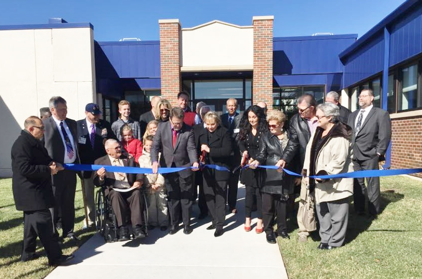 State Senator Micheal Bergstrom joins members of the Vezey and Willoughby families, along with Gov. Mary Fallin and ODVA Executive Director Myles Deering for the ribbon cutting ceremony last week at the newly renovated Vezey Veterans Complex in Oklahoma City.