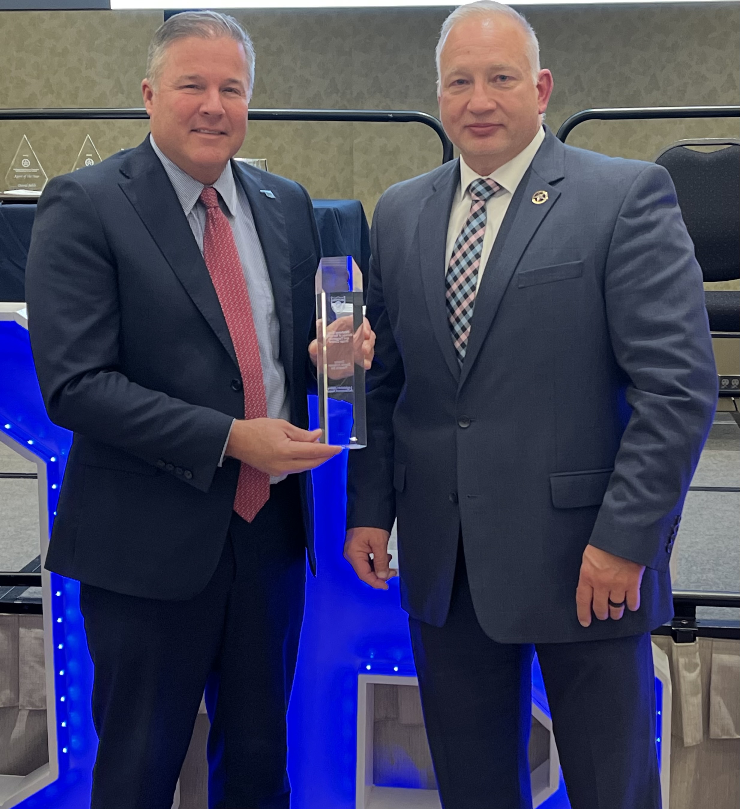 Senate Pro Tem Lonnie Paxton (left) receives the OBN Legislative Lifetime Achievement Award from OBN Director Donnie Anderson
