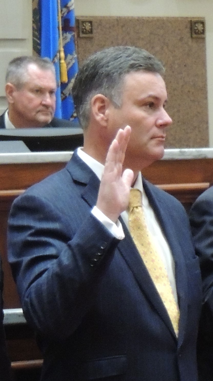 Sen. James Leewright takes oath of office at the state Capitol on Wednesday