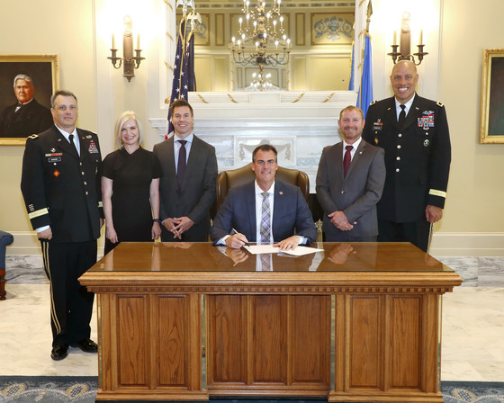 Sen. Adam Pugh, R-Edmond, and Rep. Dustin Roberts, R-Durant, were joined last week by Brigadier General Thomas Mancino, Citizens Bank of Edmond CEO Jill Castilla and Adjutant General Mike Thompson for the ceremonial signing of SB 642 by Gov. Stitt. 