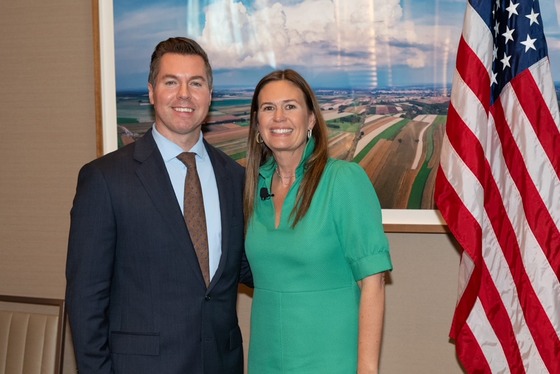 Sen. Adam Pugh and Arkansas Governor Sarah Huckabee Sanders pose for a photo at the ExcelinEd 2024 National Summit on Education.