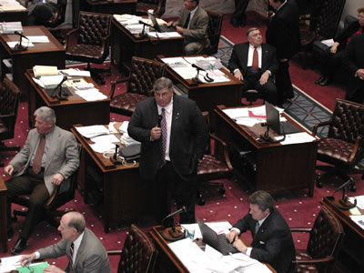 Senator Johnnie Crutchfield explains his Sales Tax Holiday Bill on the Senate Floor 2-27-02