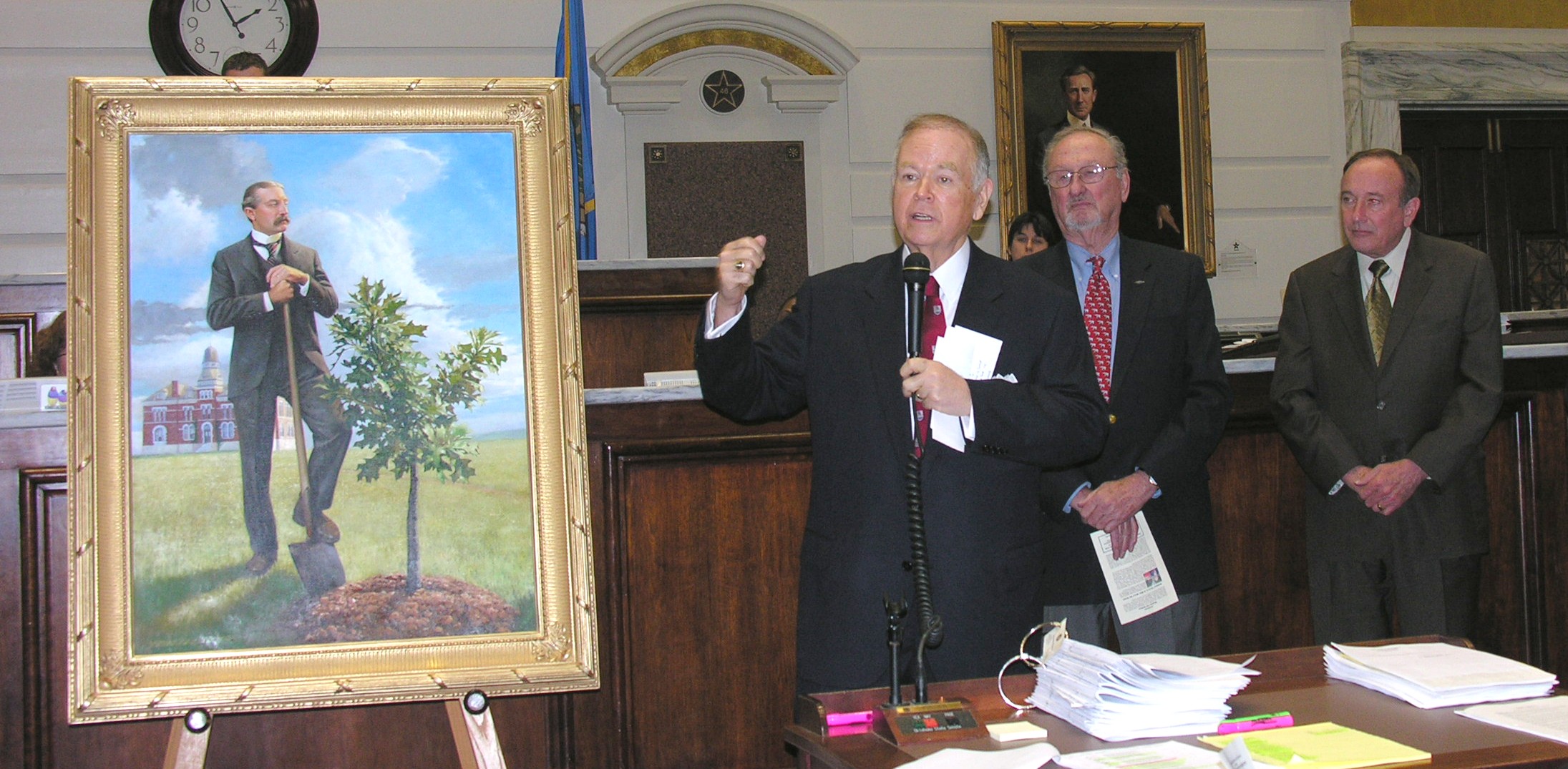 OU President David Boren discusses the legacy of the university's first President David Ross Boyd while Charles Ford and Senator Cal Hobson listen.
